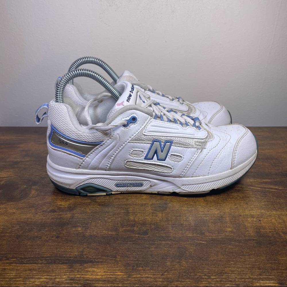 New Balance White Athletic Sneakers with Blue Accents